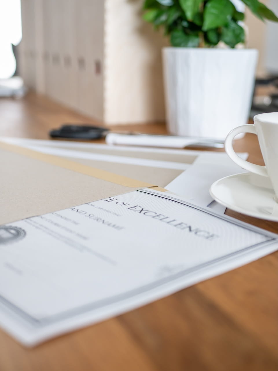a-certificate-in-a-hard-paper-envelope-placed-on-t-2026-01-11-09-36-58-utc (1)
